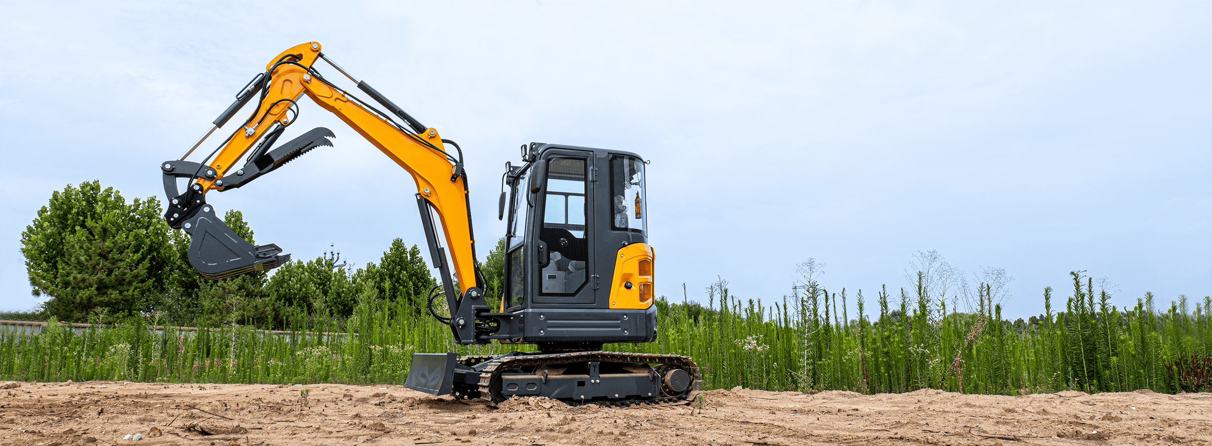 JEMG mini excavator working on a jobsite